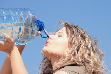 Thirsty blond woman on desert clipart