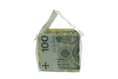 Miniature house built of paper currency clipart