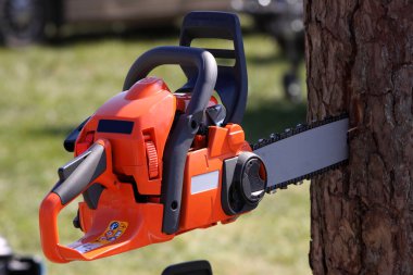 Chainsaw for heavy wood cutting clipart