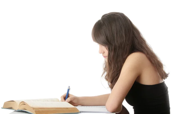 Teen girl learning at the desk — Stock Photo, Image