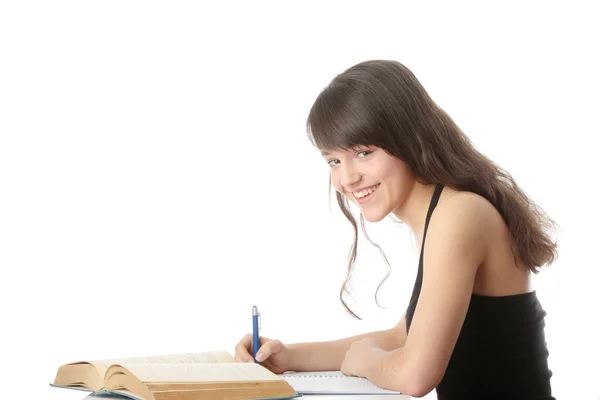 Adolescente chica aprendizaje en el escritorio — Foto de Stock