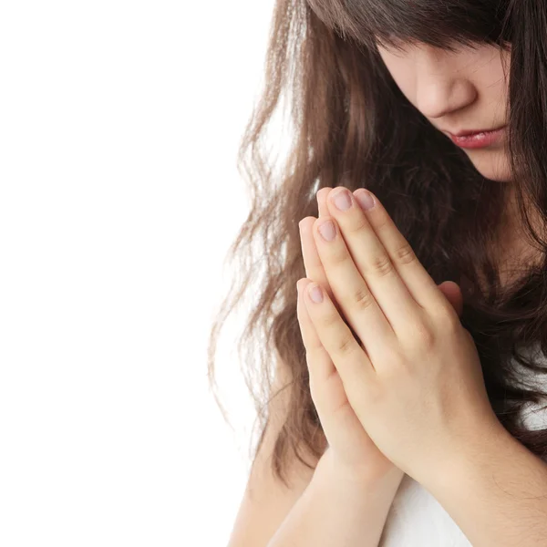 孤立在白色背景上的一个年轻的白人女子祈祷特写肖像 — 图库照片
