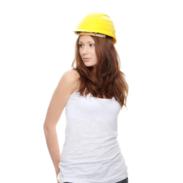 Инженерша в жёлтом шлеме — стоковое фото