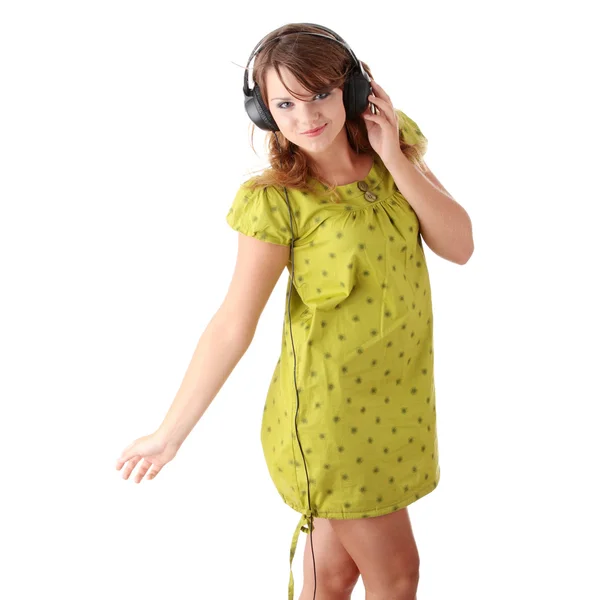 Beautiful Teenage Girl Green Dress Listening Music Big Headphones Isolated — Stock Photo, Image