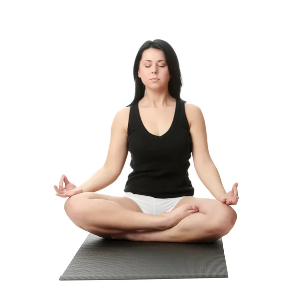 Korpulent kvinna träning yoga — Stockfoto
