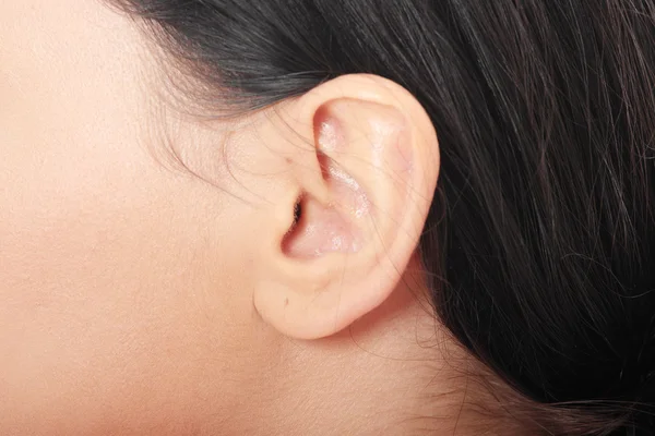 Женское ухо — стоковое фото