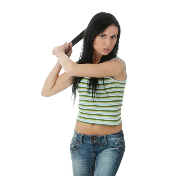 Mujer tratando de golpear algo —  Fotos de Stock