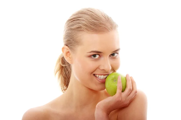 Mooi meisje eten groene appel — Stockfoto