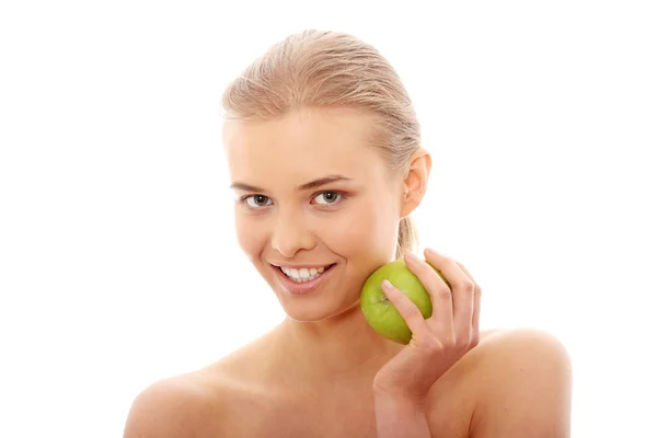Beautiful girl eating green apple — Stock Photo, Image
