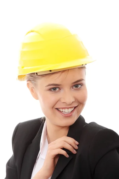 Selbstbewusste Arbeiterin mit Helm — Stockfoto