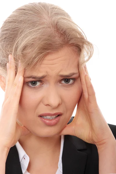 Junge Geschäftsfrau mit Kopfschmerzen — Stockfoto