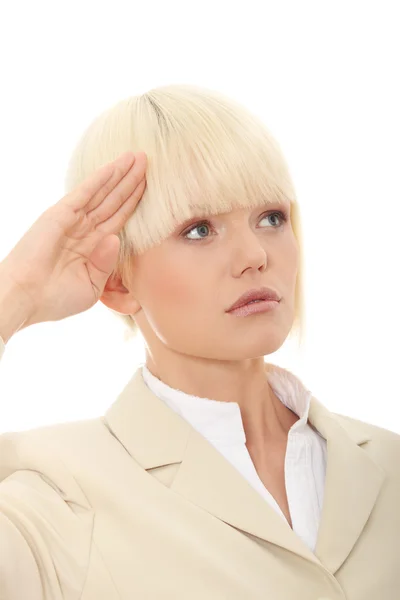 Attractive business woman saluting — Stock Photo, Image