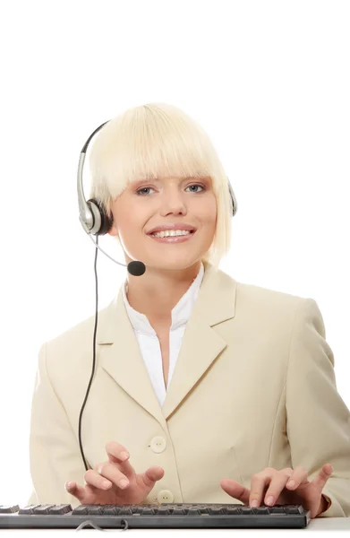 Mujer del centro de llamadas con auriculares —  Fotos de Stock