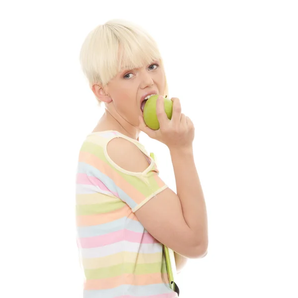 Beautiful young woman eating apple — Stock Photo, Image