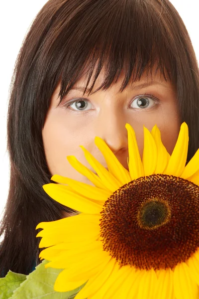 Mujer Joven Con Una Gran Flor Del Sol Aislada —  Fotos de Stock