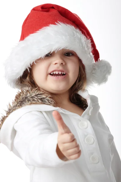 岁的女孩在圣诞老人帽子被隔绝在白色背景上的肖像 — 图库照片
