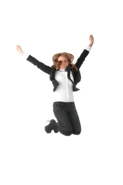 Ділова жінка стрибає руками в повітрі — стокове фото