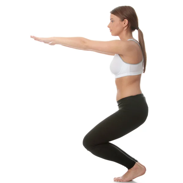 Krásná mladá žena, která dělá jóga cvičení — Stock fotografie