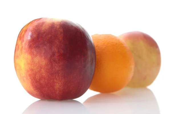 Apples and orange — Stock Photo, Image