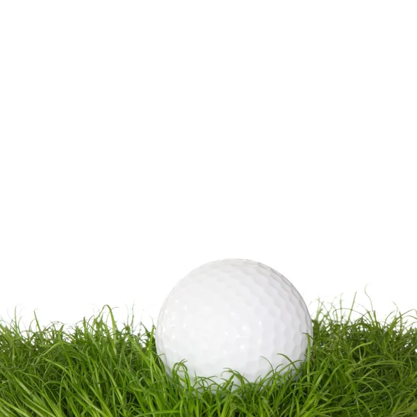 stock image A golf ball in the grass isolated on white background