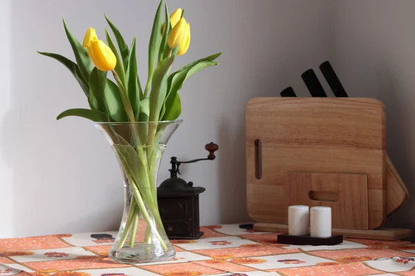 Stock image Tulips on kitchen table