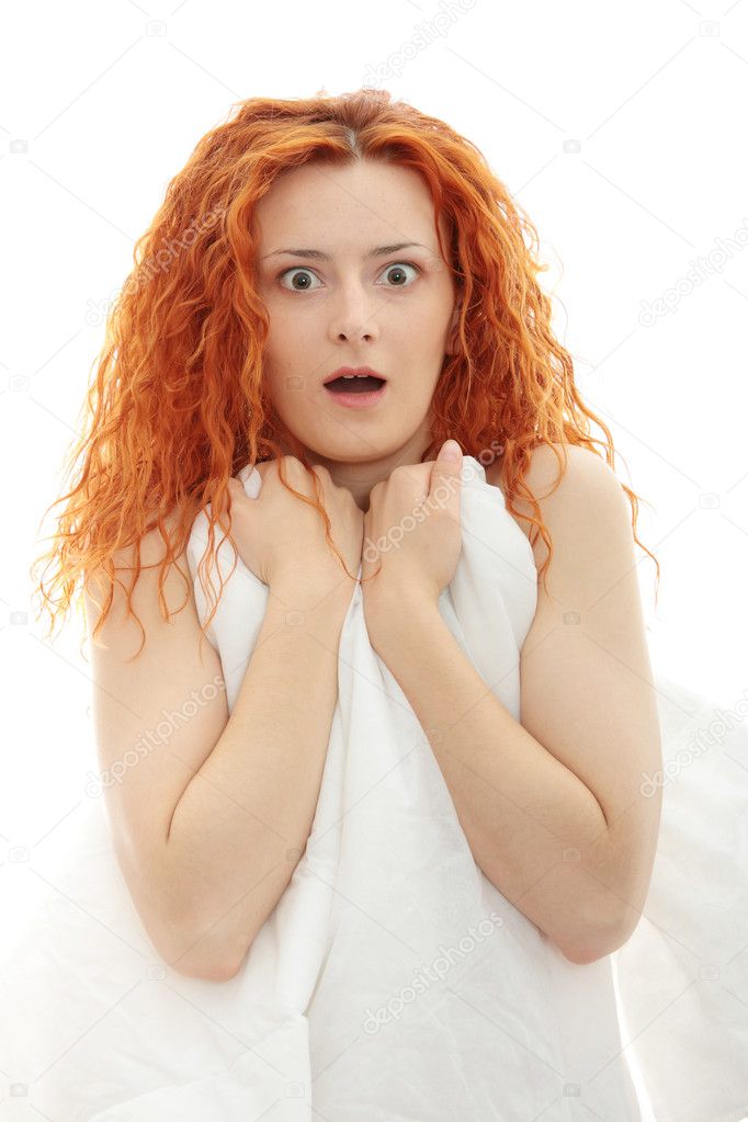 Shocked redhead woman