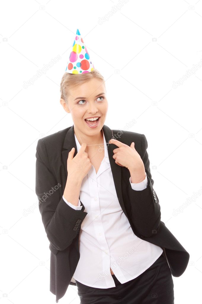 Young happy woman in business suit wearing party favors