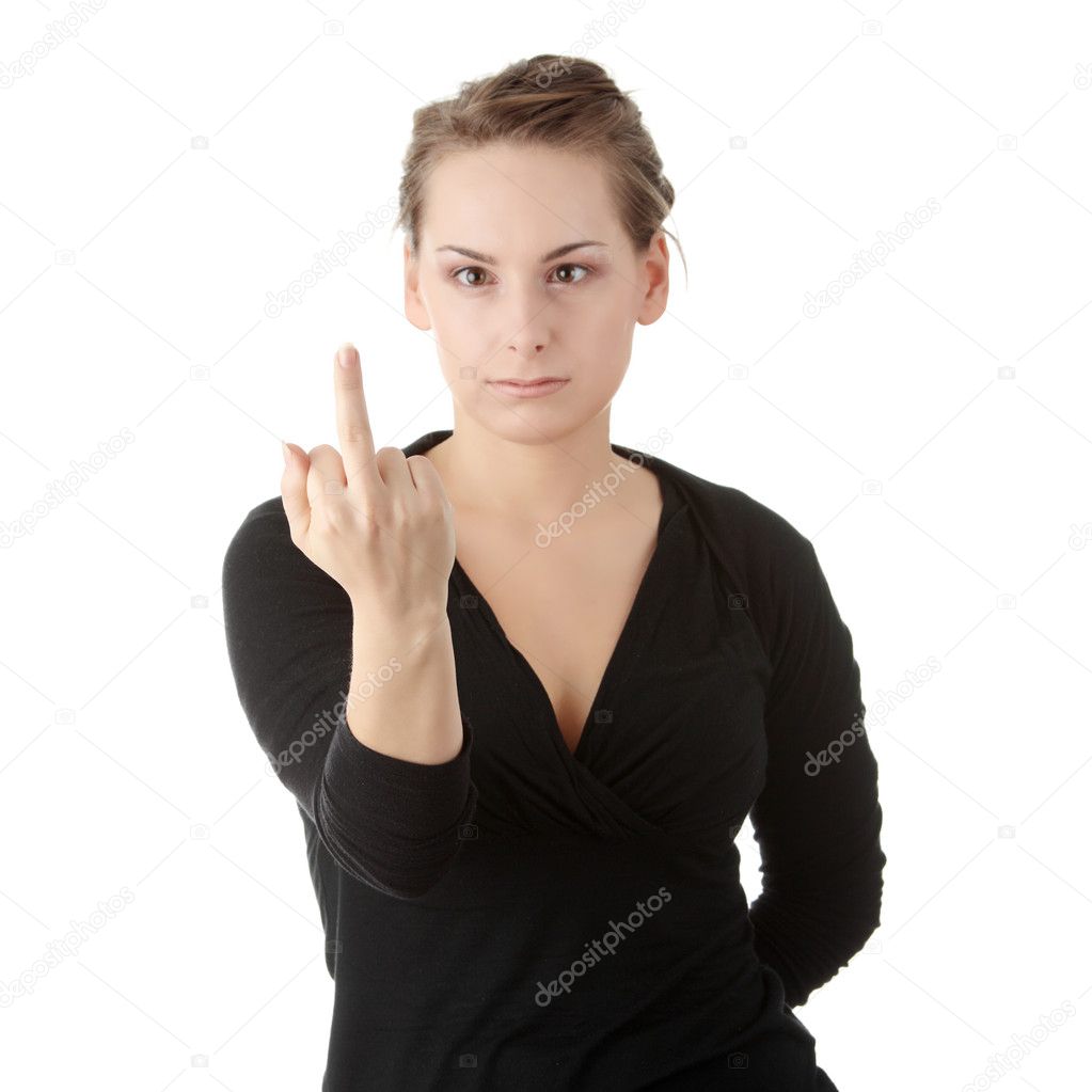 Angry girl showing middle finger.Isolated on white