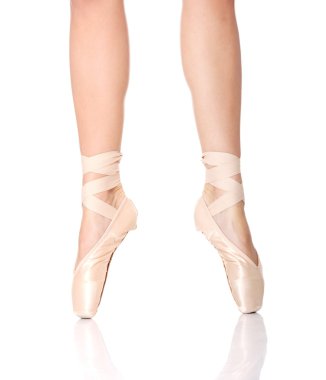 Detail of ballet dancer's feet isolated on white clipart