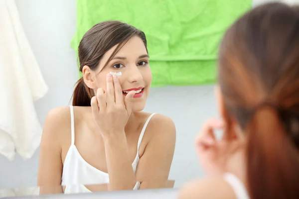 Beautiful Woman Applying Cream Face Bathroom — Stock Photo, Image