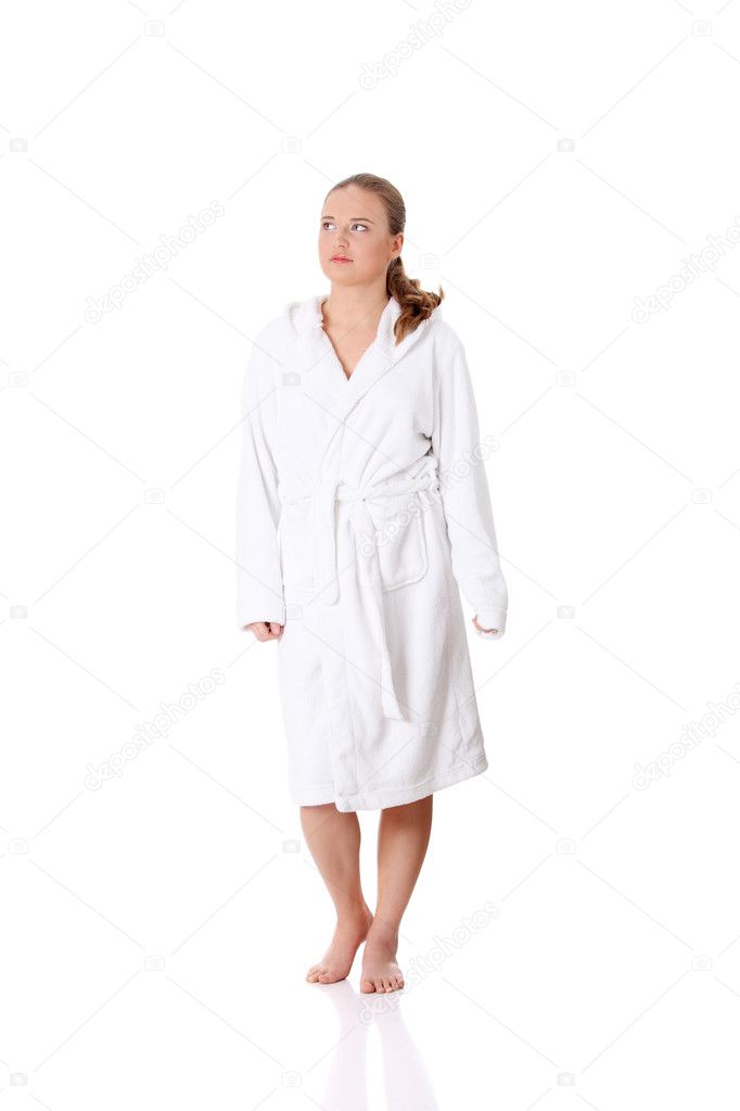 Young beautiful woman wearing bathrobe