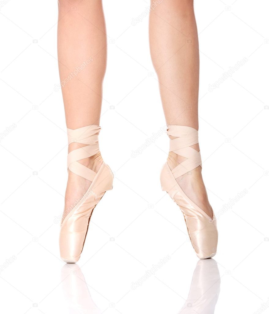 Detail of ballet dancer's feet isolated on white