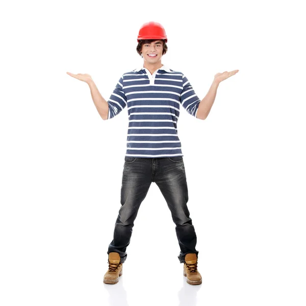 Hombre joven con casco rojo — Foto de Stock