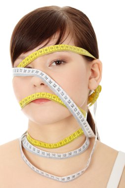 Young woman with measuring tape clipart