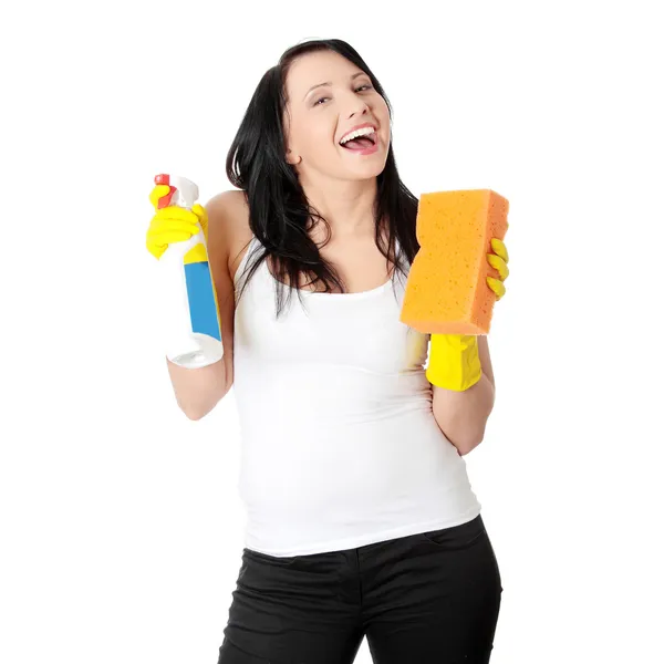 Mujer con esponja y spray . — Foto de Stock