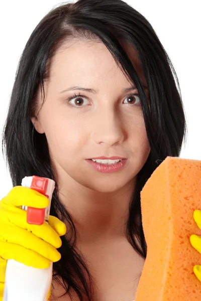 Woman with sponge and spray. — Stock Photo, Image