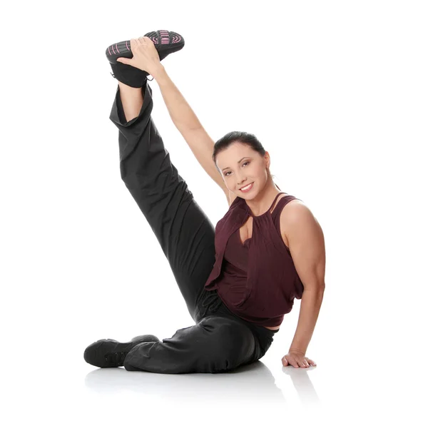 Mladá žena cvičí — Stock fotografie