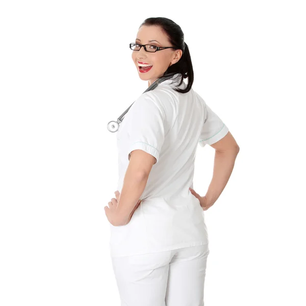 Jonge gelukkig vrouwelijke verpleegkundige of Arts — Stockfoto
