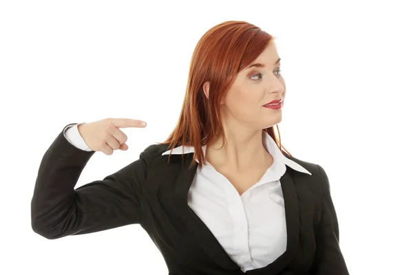 Businesswoman pointing direction — Stock Photo, Image