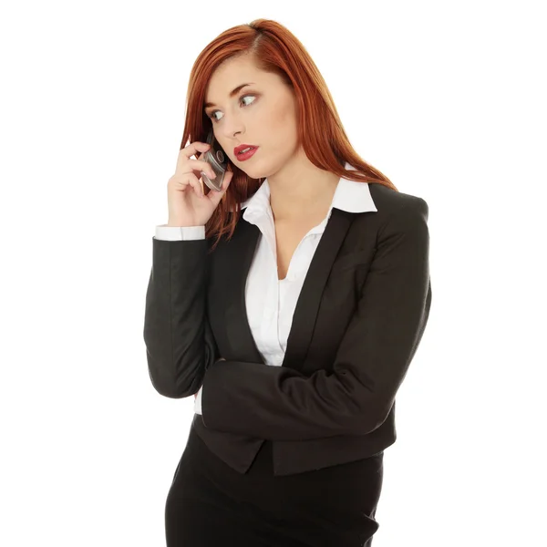 Bizneswoman mówi przez telefon — Zdjęcie stockowe