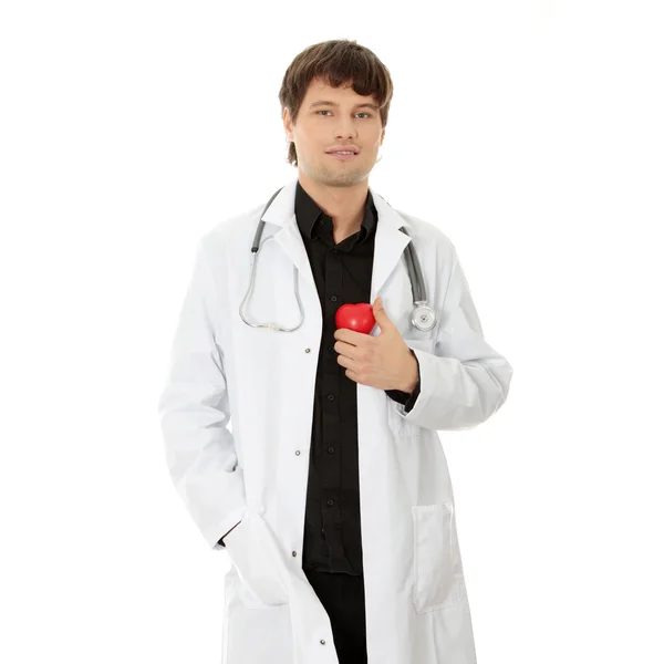 Lekarz trzymając zabawka kształt serca — Zdjęcie stockowe