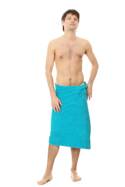 Jovem bonito com a toalha — Fotografia de Stock