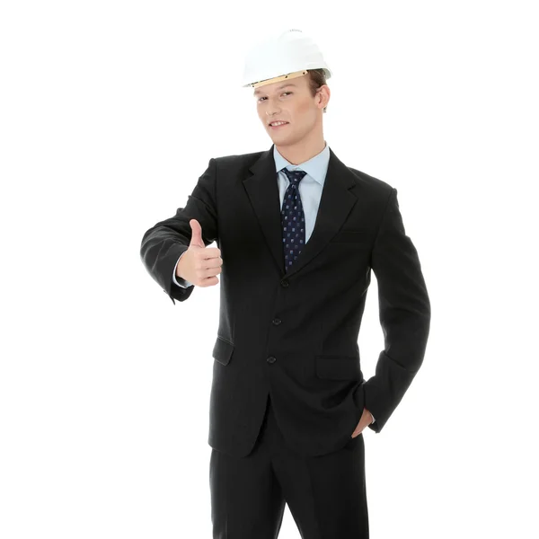 Jungunternehmer mit weißem Helm gestikuliert ok — Stockfoto