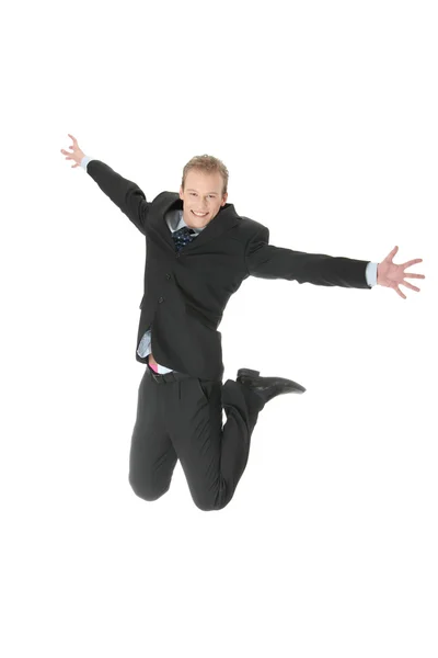 Jonge gelukkig Kaukasische zakenman springen — Stockfoto