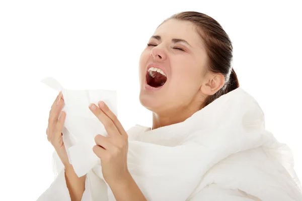 Young beautiful sick woman sneezeing — Stock Photo, Image