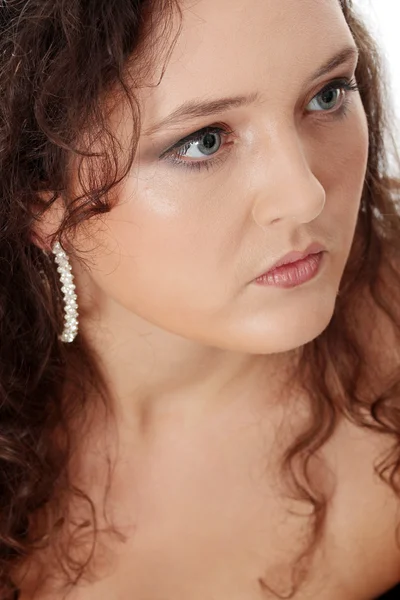 Young corpulent woman in elegant make up. — Stock Photo, Image
