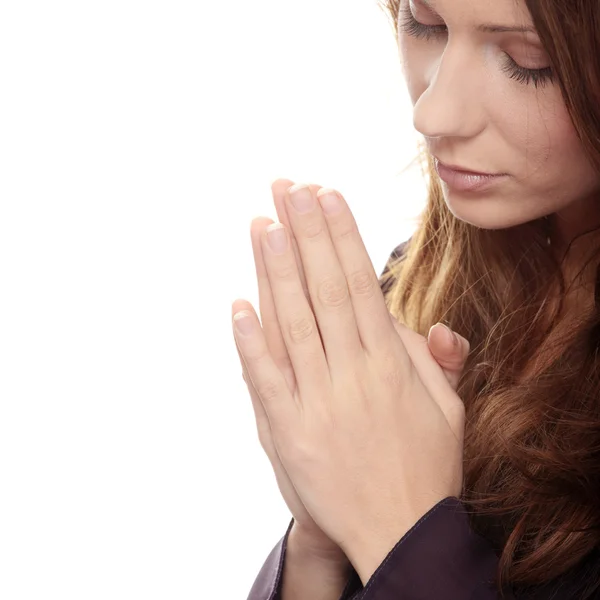 Jovem mulher caucasiana rezando — Fotografia de Stock