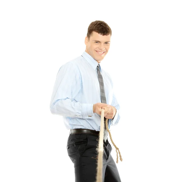 Businessman pulling on a piece of rope — Stock Photo, Image