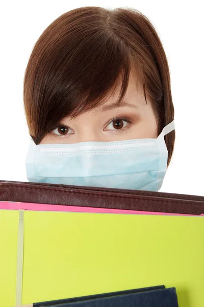 Jovem estudante mulher com máscara — Fotografia de Stock