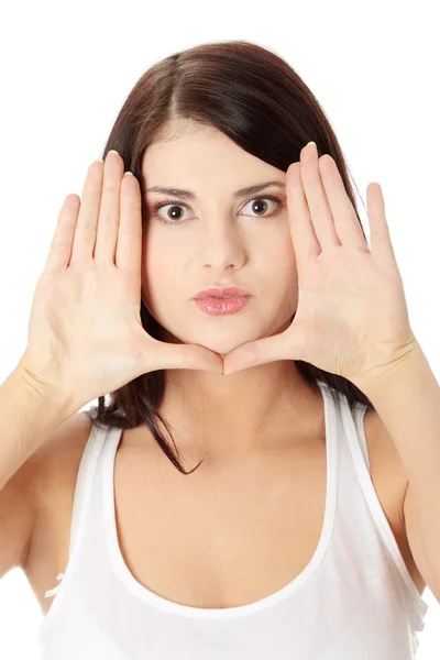 Young attractive woman framing her face — Stock Photo, Image